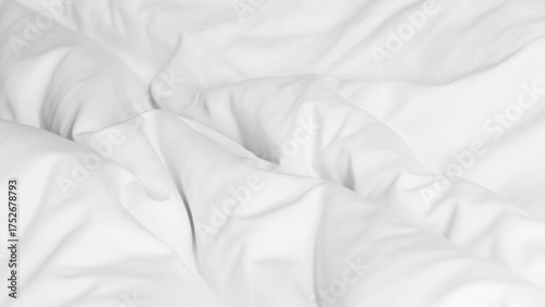 Close up soft white wrinkled duvet bed sheet texture, minimal background for comfort, cleanliness, and relaxation concept in bedroom or hotel interior