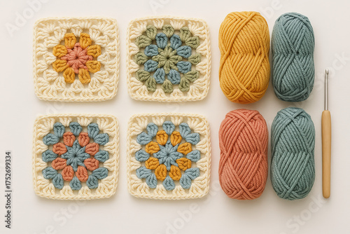 Colorful Crochet Granny Squares and Yarn Balls with Crochet Hook Lay Flat