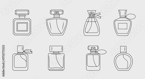 A collection of elegant perfume bottles with intricate designs and unique shapes.