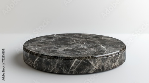 Elegant round marble display platform for product presentation.