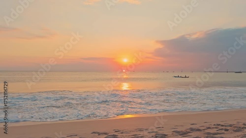 Jimbaran beach Bali with traditional fisherman boat and colorful sunset above the ocean Bali, Indonesia