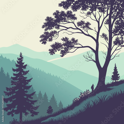 A lone figure stands beneath a large silhouetted tree on a grassy hill overlooking misty blue green mountains and evergreen forests