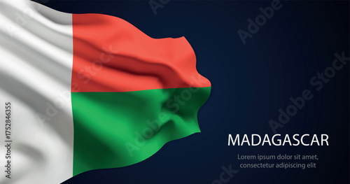Madagascar national flag with elegant folds on dark background