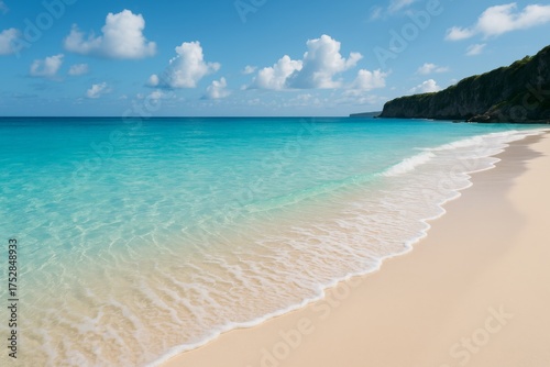 Seashore Serenity: Witness the harmonious dance of crystal-clear turquoise waters gently caressing a pristine sandy beach, mirroring a vibrant blue sky adorned with fluffy white clouds.