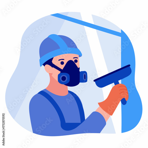 Construction worker painting wall while wearing respirator mask  