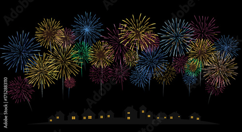 Colorful Fireworks Display Over a Silhouetted Town