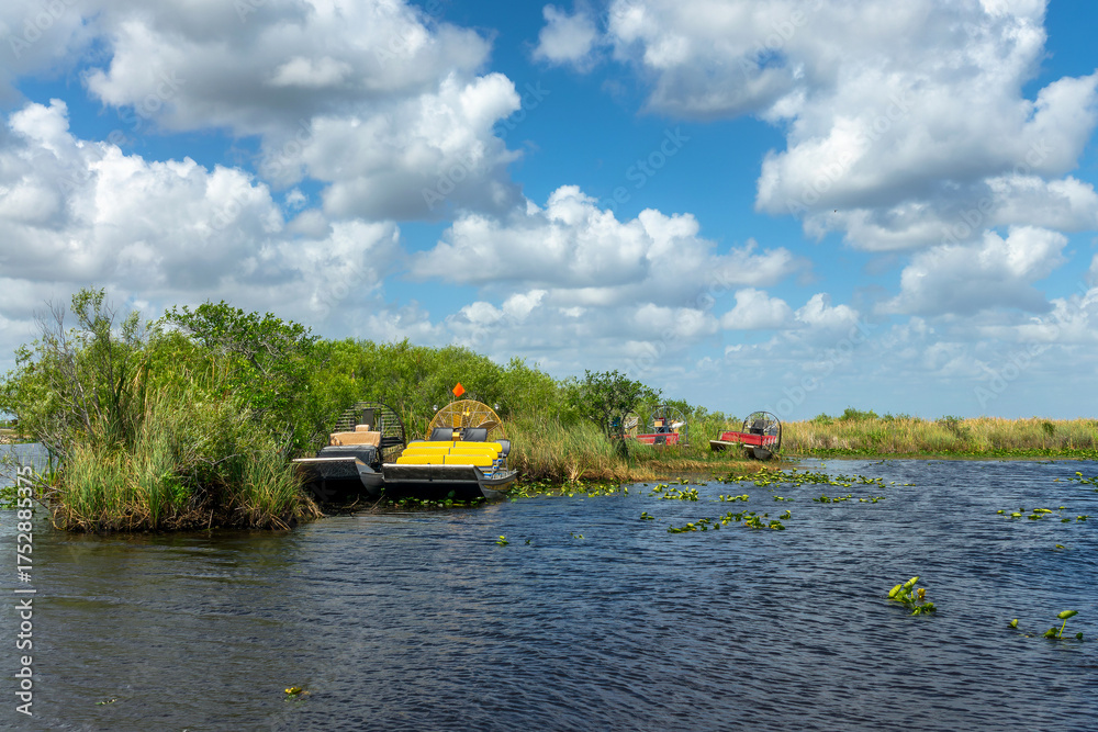 Fototapeta premium Airboats on the water, swamp scenic landscape in the Everglades National Park, Florida