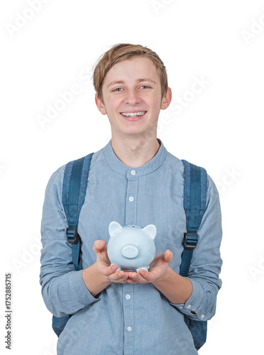 Teenage student guy carrying a backpack and holds carefully a piggy bank, portrait isolated on transparent background. Financial education and knowledge investment and savings concept
