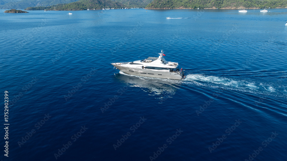 Fototapeta premium A modern yacht journey surrounded by endless blue sea and serenity
