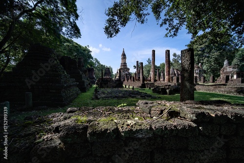 A large stone building with a small tower in the middle