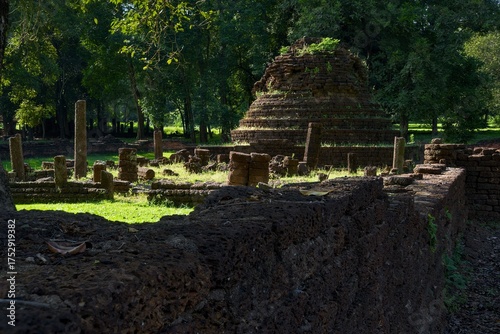 A wall with a stone structure in the middle