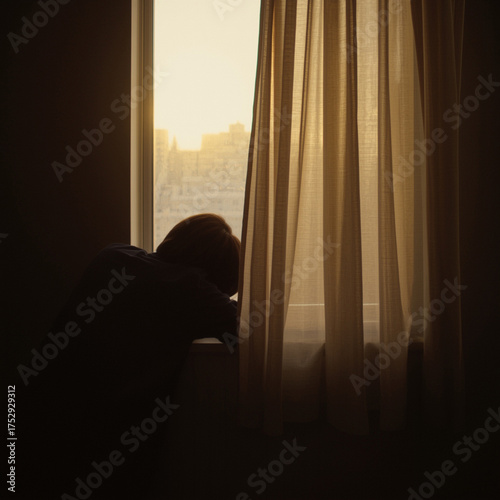 Soft daylight photo of person leaning on window with faint sunlight through curtain, minimal background, warm desaturated tone symbolizing fatigue and contemplation, cinematic atmosphere,