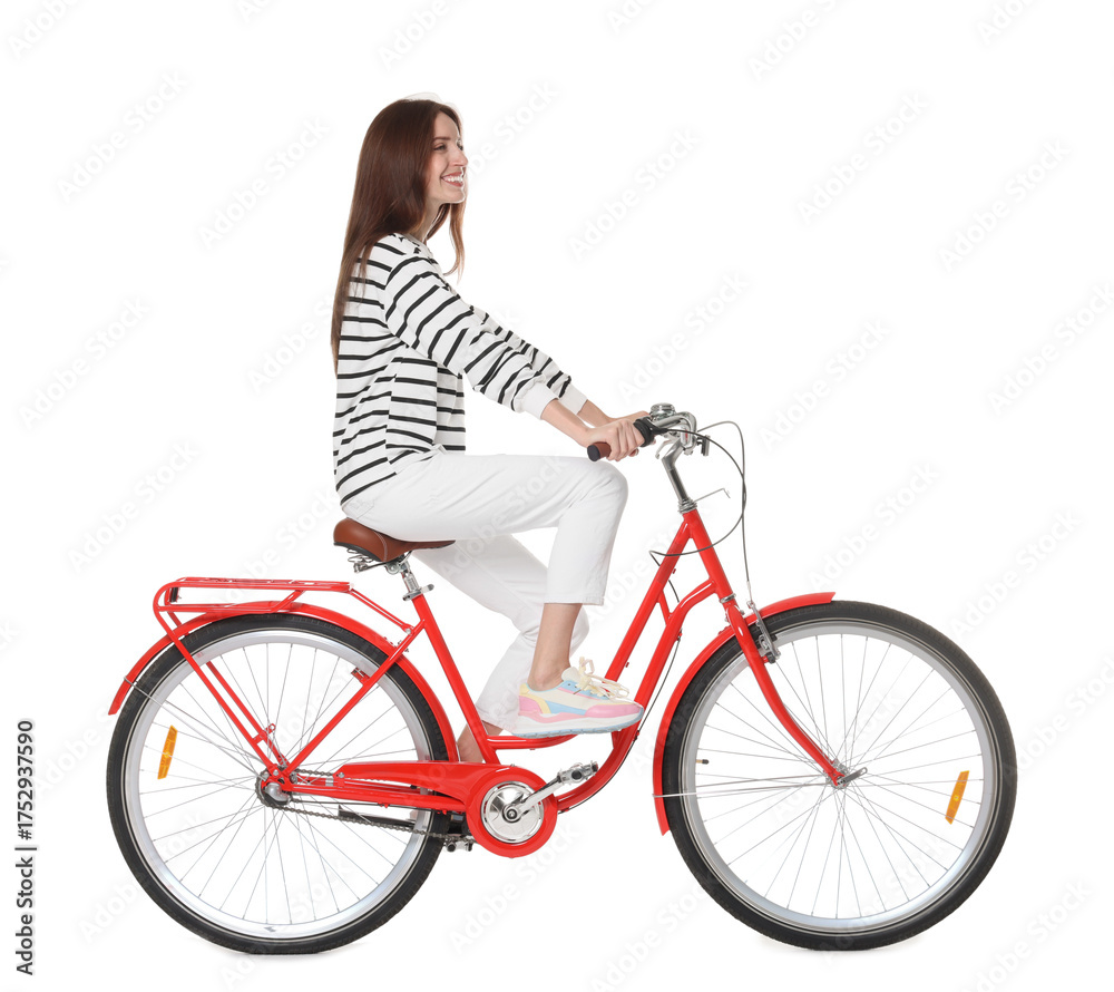 Naklejka premium Smiling woman riding red bicycle on white background