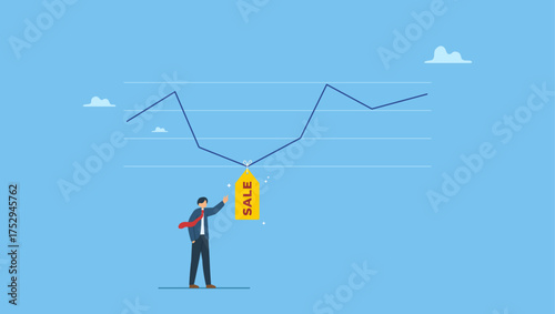 Businessman investor expertise pointing at lowest with sale price tag on stock market graph. Stock market is on sale when market plunge in economic crisis, buy point to make profit in long run.
