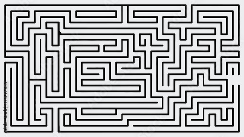 A complex black and white maze illustration with a challenging path to navigate and solve the puzzle completely