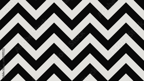 A black and white chevron pattern forming a seamless zig zag design with sharp angular lines repeating across