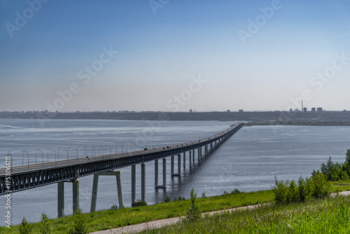 The long bridge across the wide Volga River on high concrete foundations in Ulyanovsk, Russia is called the Presidential Bridge