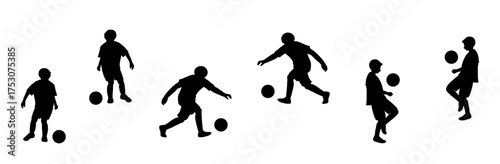 シルエット　サッカーをする少年　イエローユニフォーム　全身