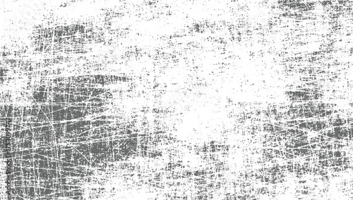 A distressed gray and white textured background with numerous scratches and marks.