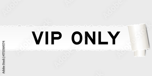 Ripped gray paper background that have word VIP (abbreviation of very important person) only under torn part