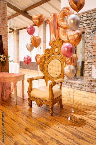 Golden Throne with Rose Gold and Silver Balloons for a Special Nineteenth Birthday Celebration Decor Setup