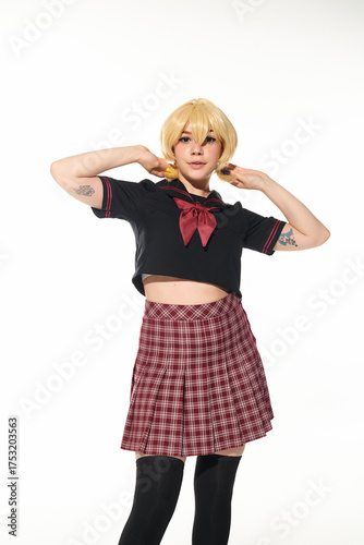 Wallpaper Mural Youthful charm anime cosplay with tartan skirt and blond wig Torontodigital.ca
