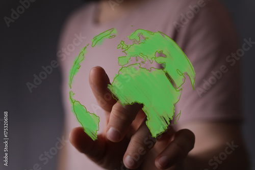 A human hand interacts with...