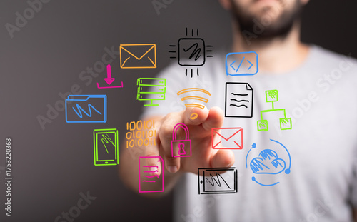 Hand pointing at digital ic...