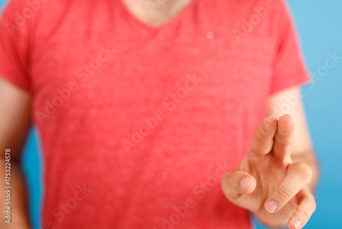 Close-up of a man in a red ...