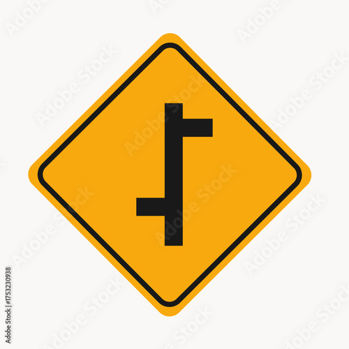 Vector art of yellow road sign indicating a side road junction, providing drivers with clear guidance for navigating intersections and ensuring safe turns