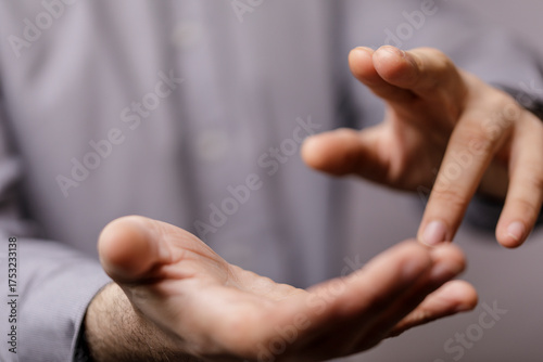 Close-up of open hands gest...
