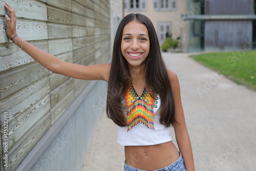 Native American girl with traditional colorful outfit 