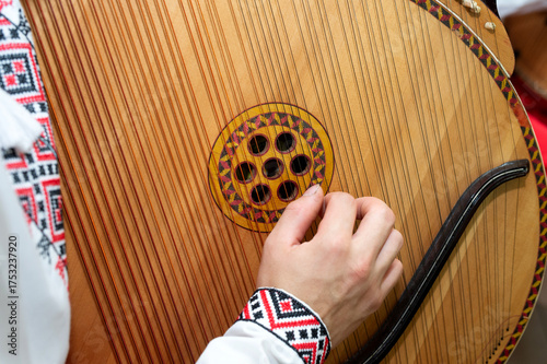 Bandura is a Ukrainian folk stringed plucked musical instrument. A classical (diatonic) and modern (diatonic or chromatic) instrument from the harp, gusel, and psaltery family.