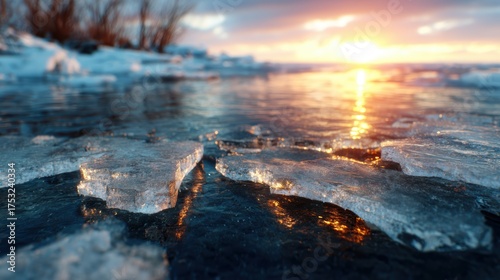 A mesmerizing landscape showcasing shimmering ice pieces floating on water during sunset, reflecting vibrant colors and creating an ethereal atmosphere of tranquility.