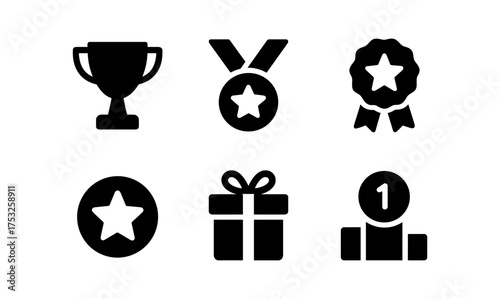 Black silhouette icons of trophies, medals, and award symbols for achievements