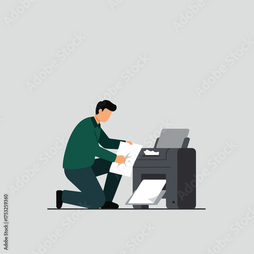 Person on knees inserts paper into copier