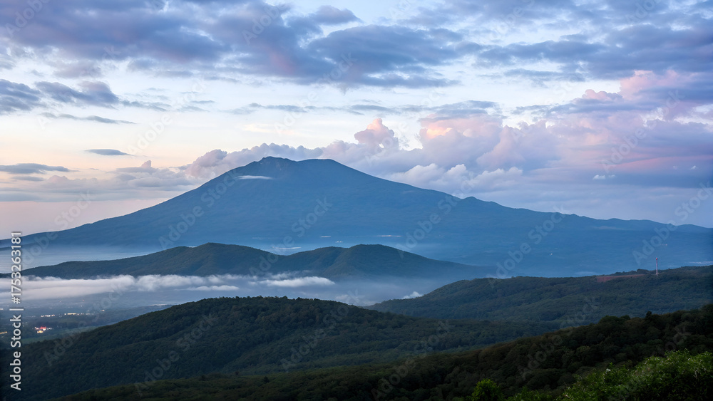 Naklejka premium mountain landscape with clouds