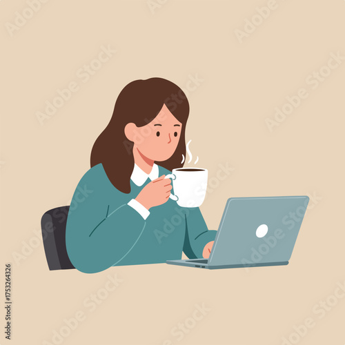 Woman holding coffee mug while working on laptop