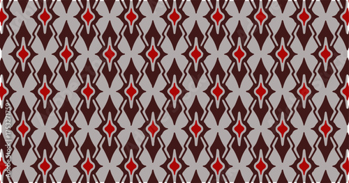 Seamless geometric pattern with brown and red diamond shapes creating a bold decorative background.