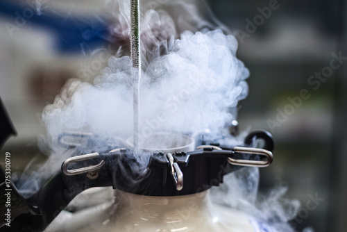 Close-up sperm freezing chamber tank vapor Liquid nitrogen cryogenic storage in laboratory