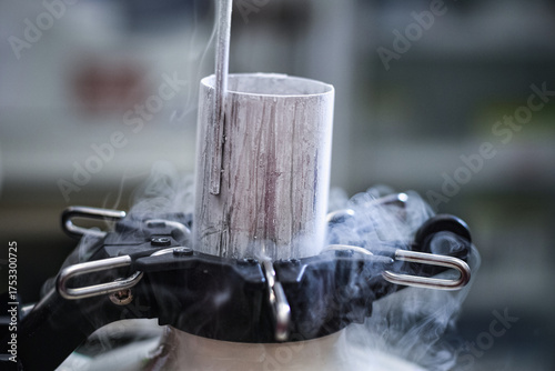 Close-up sperm freezing chamber tank vapor Liquid nitrogen cryogenic storage in laboratory