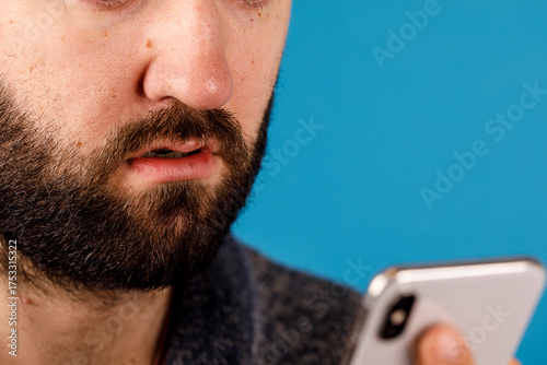 A man is looking intently a...