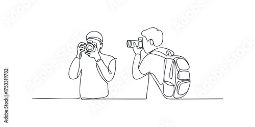 Two people taking photos with cameras