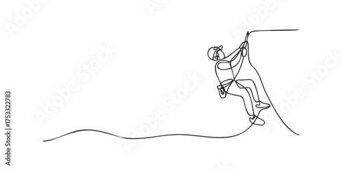 Person climbing up steep rock face with rope