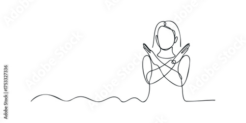 Woman with arms crossed depicting stop gesture