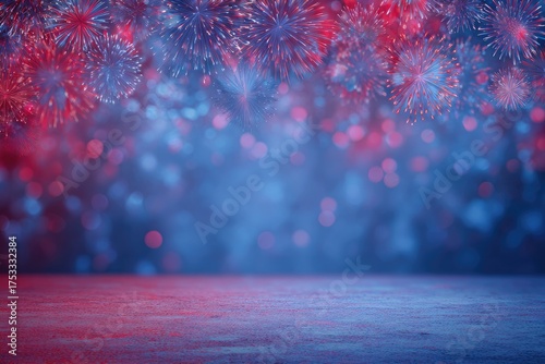 A festive display of red and blue fireworks erupting against a blurred, textured background