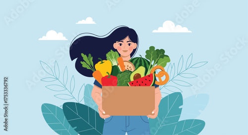 A young woman carrying a box full of fresh fruits and vegetables. 