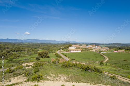 This landscape photo was taken in Europe, Spain, Aragon, Zaragoza, in summer. It shows Casas de Esper, under the Sun.