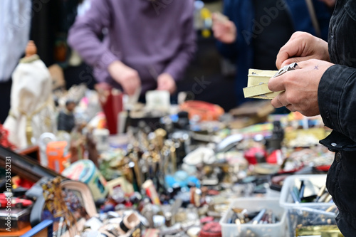 A person looking for some deals in a flea market