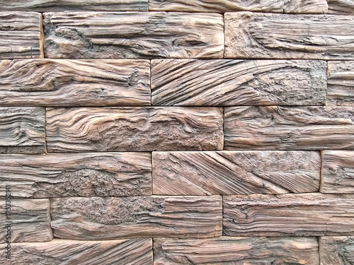 rectangular stone-like wall tiles arranged in a brick pattern